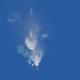 A shot of yesterday’s failed launch, showing smoke rising from the first stage booster.